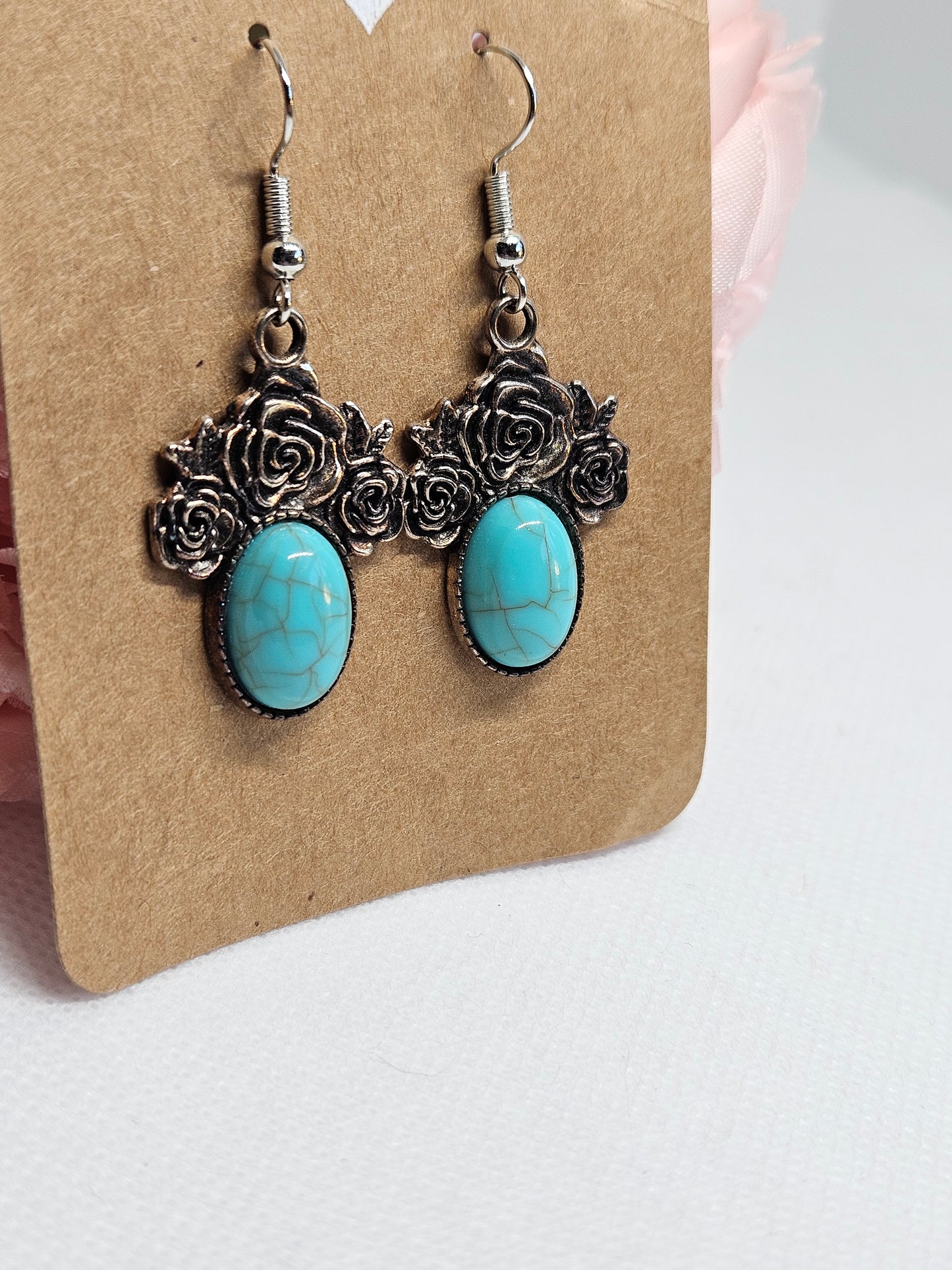 Turquoise Earrings with Rose Design.