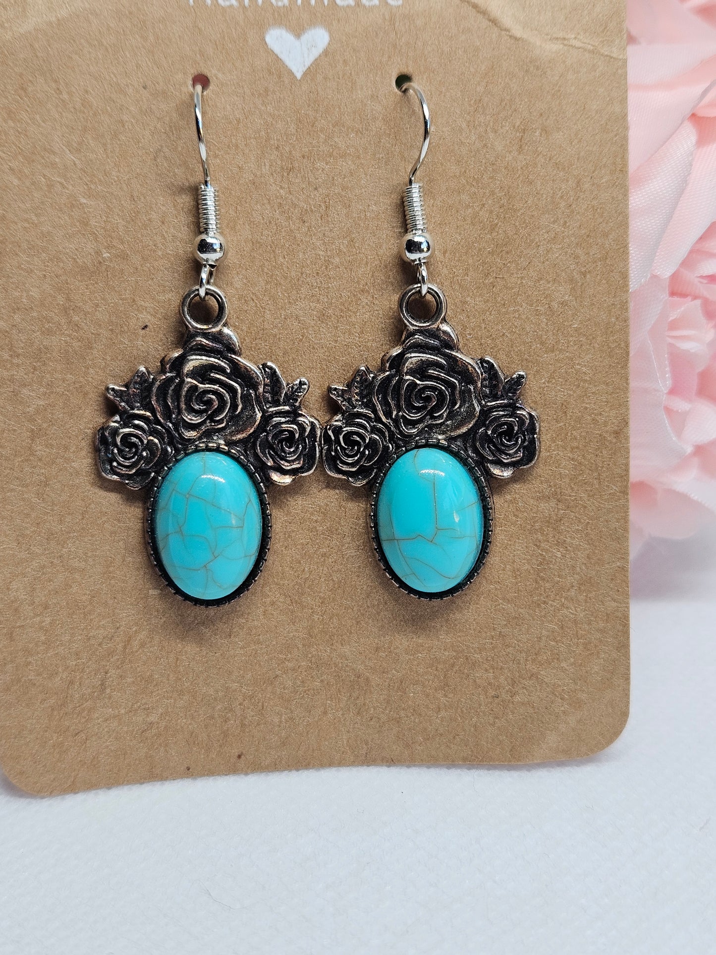 Turquoise Earrings with Rose Design.