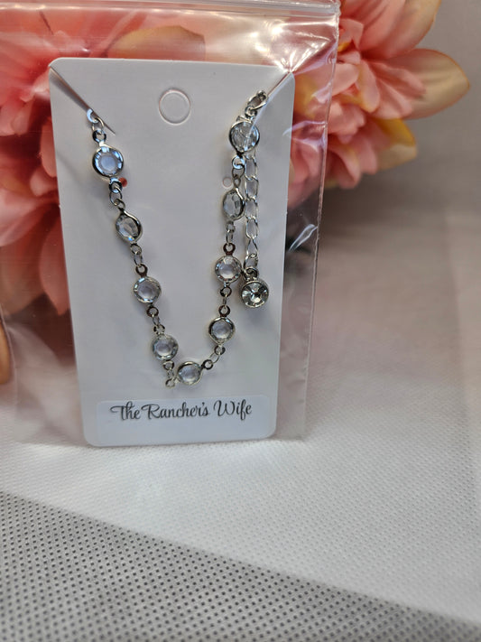 Silvery bracelet with Imitation Zirconia.