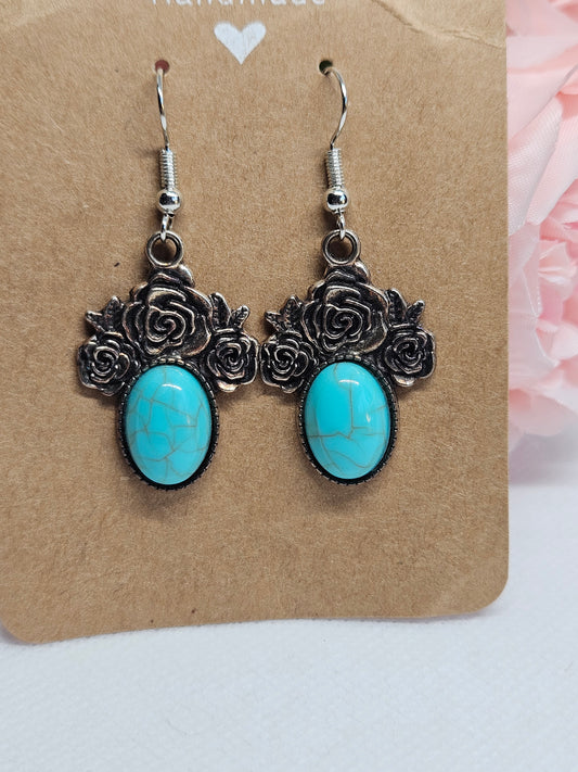 Turquoise Earrings with Rose Design.